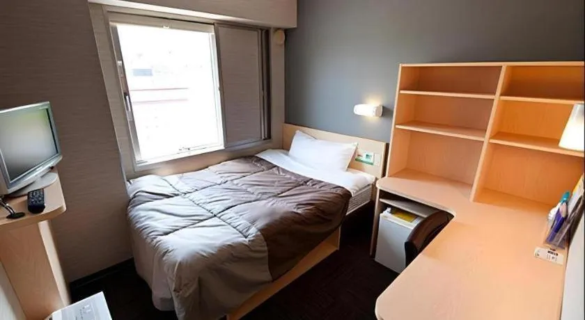 Bed in Super Hotel Arai-Niigata