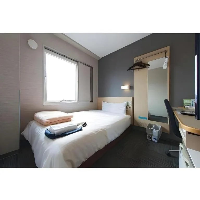 Bed in Super Hotel Arai-Niigata