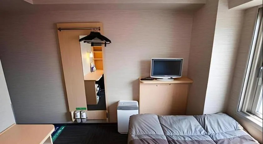 Bed in Super Hotel Arai-Niigata