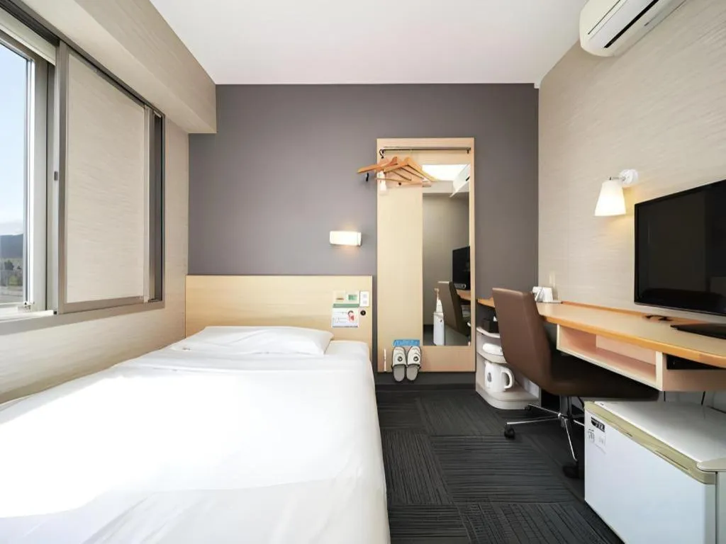 Bed in Super Hotel Arai-Niigata