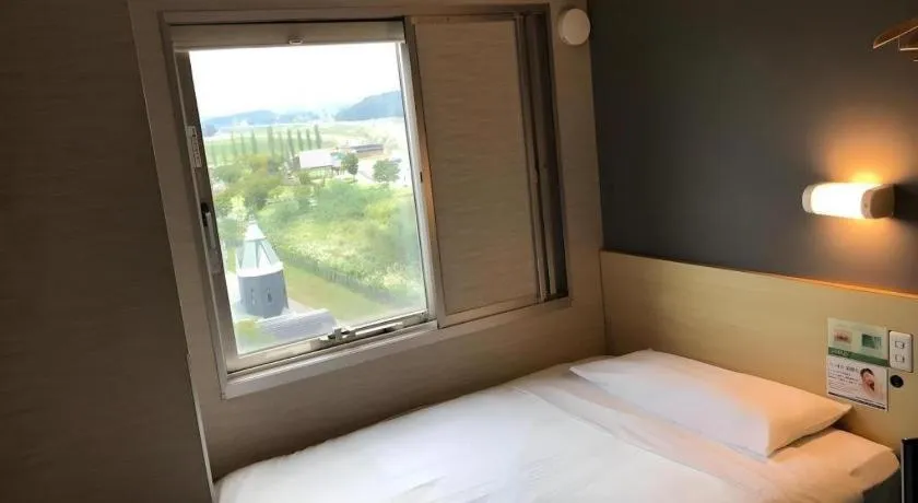 Bed in Super Hotel Arai-Niigata