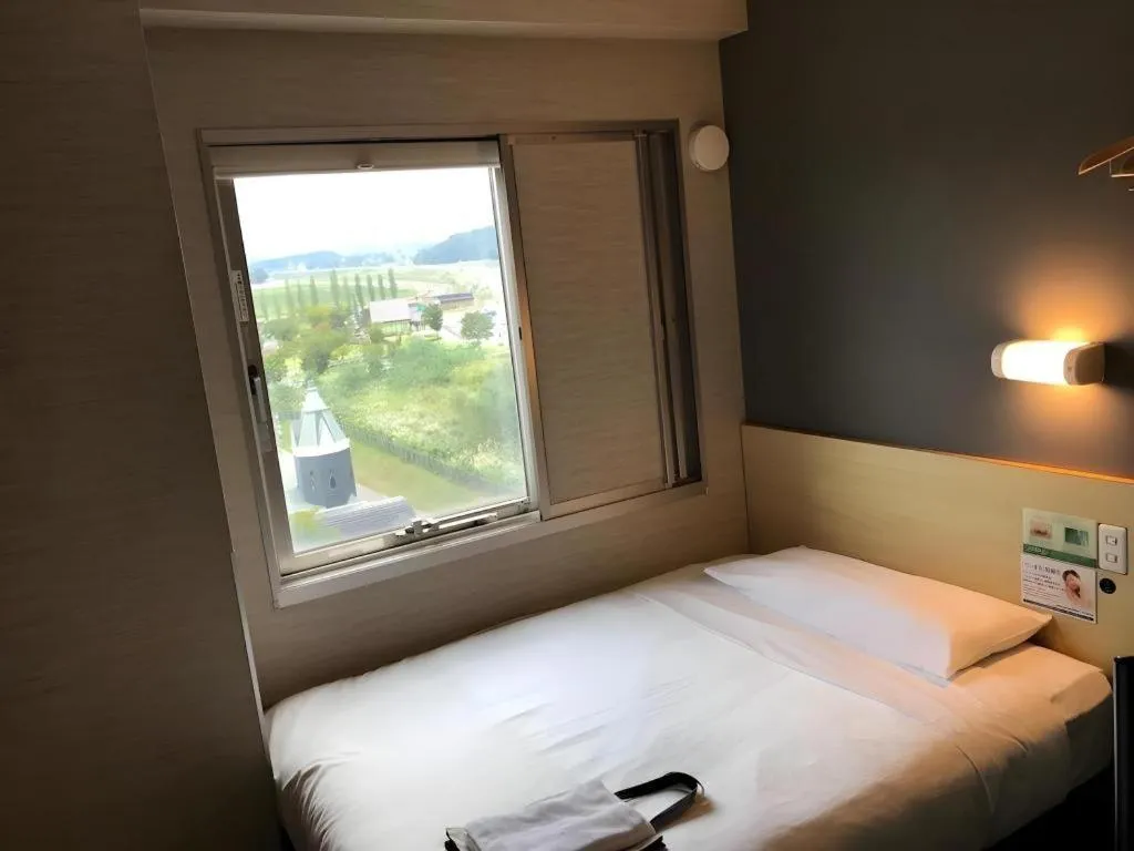 Bed in Super Hotel Arai-Niigata