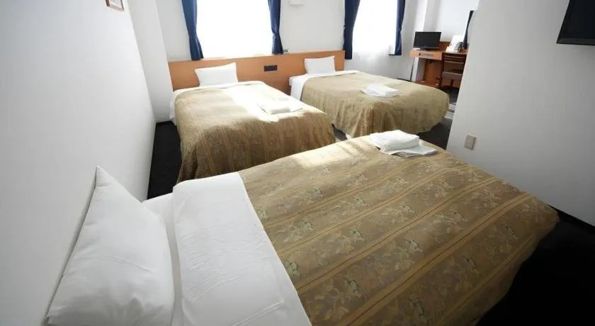 Bed in Hirata Maple Hotel