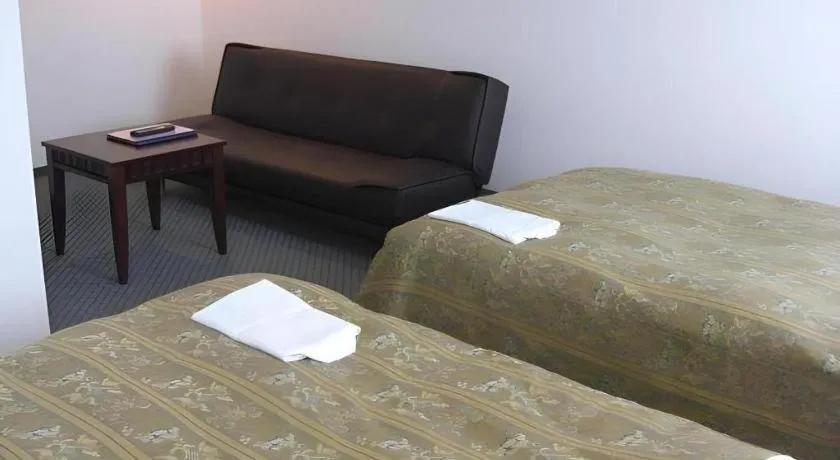 Bed in Hirata Maple Hotel