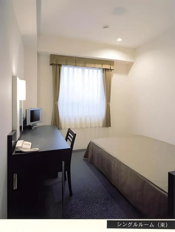 Bed in Hirata Maple Hotel