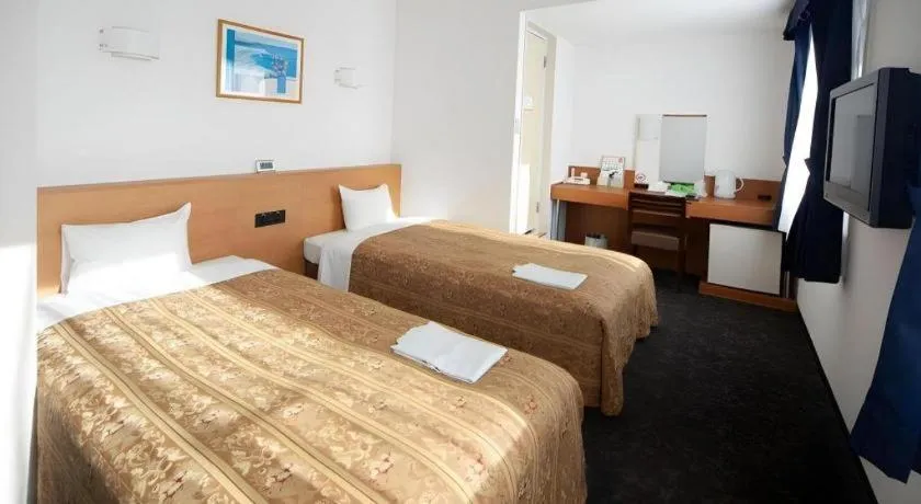 Bed in Hirata Maple Hotel