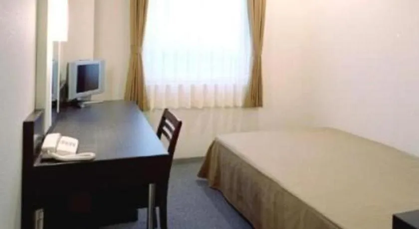 Bed in Hirata Maple Hotel