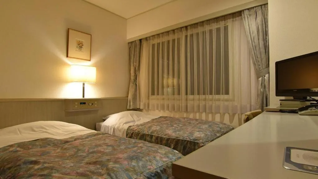 Bed in City Park Hotel Hachinohe
