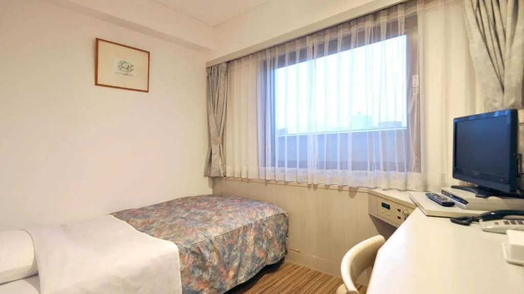 Bed in City Park Hotel Hachinohe