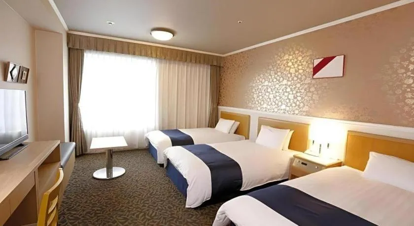 Bed in Green Hill Hotel Onomichi