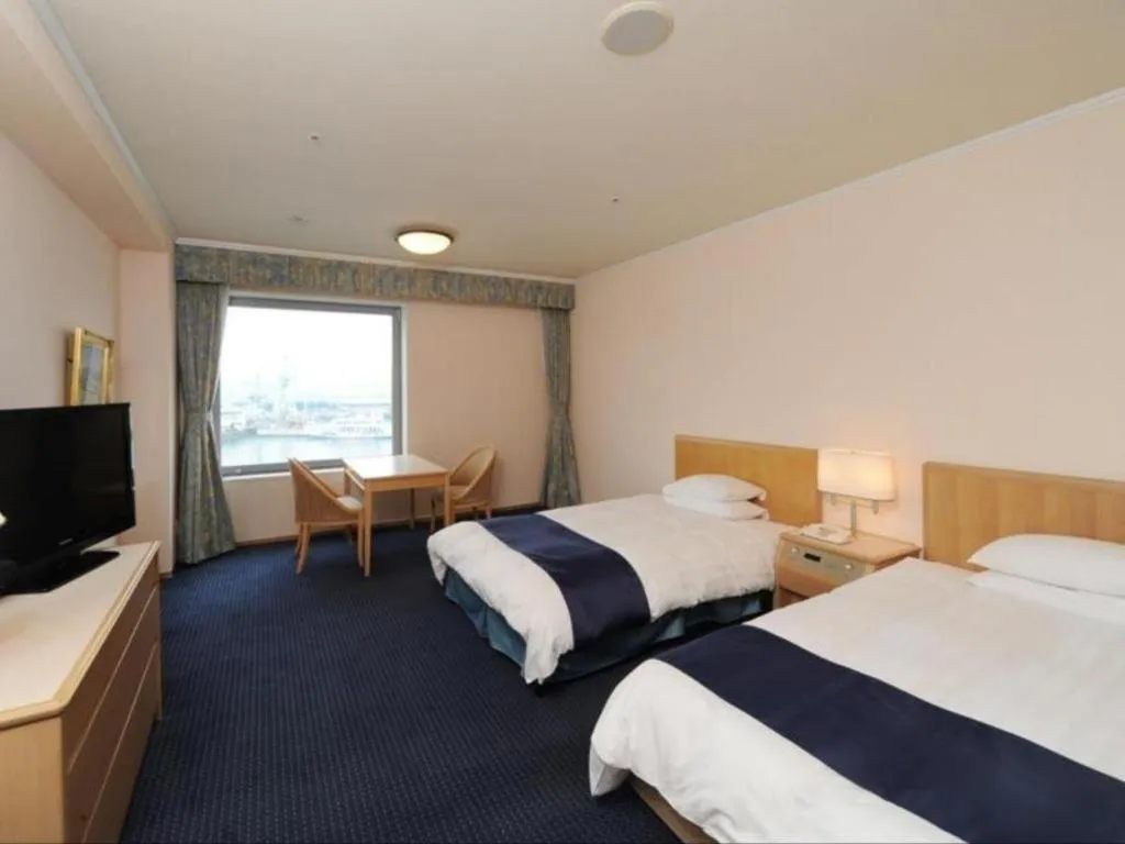 Bed in Green Hill Hotel Onomichi