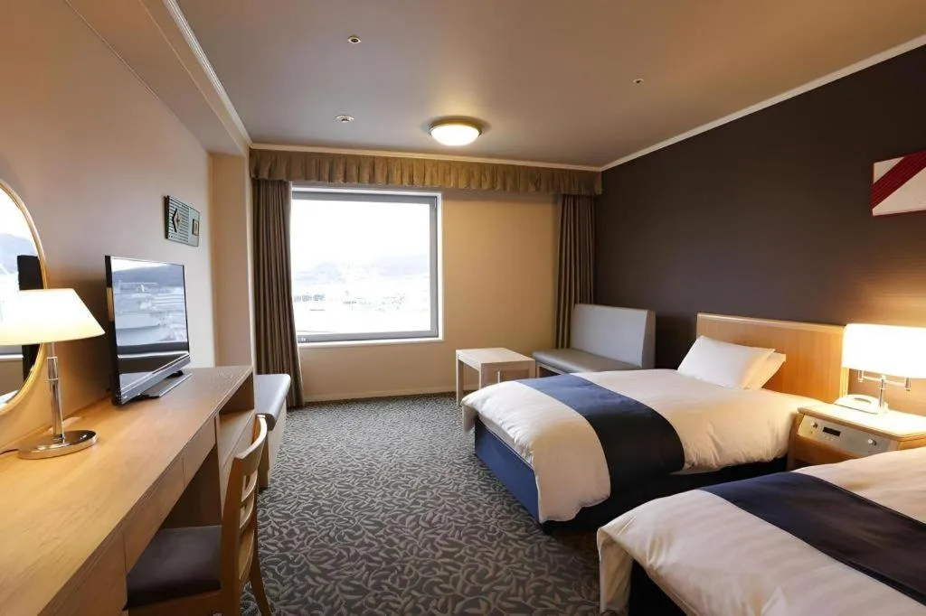 Bed in Green Hill Hotel Onomichi