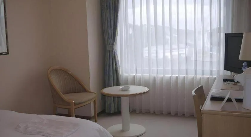 Bed in Green Hill Hotel Onomichi