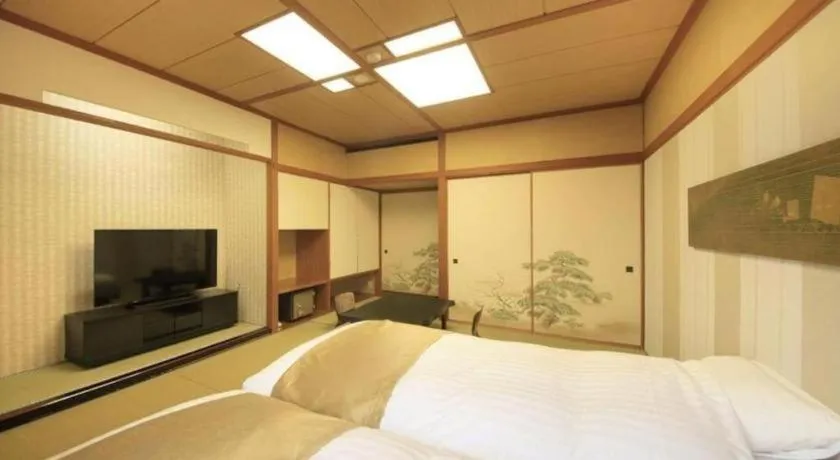Bed in Centurion Hotel Technoport Fukui- Artificial Radium Hot Spring