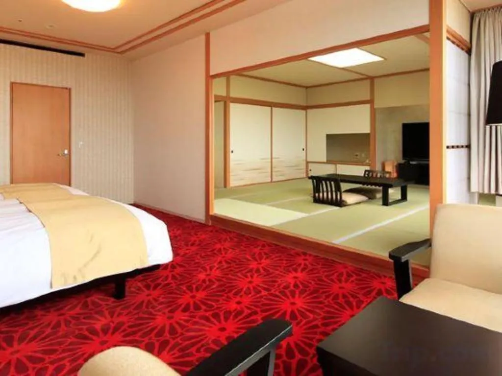 Bed in Centurion Hotel Technoport Fukui- Artificial Radium Hot Spring