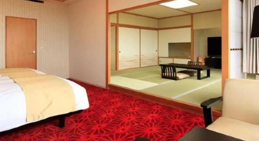 Bed in Centurion Hotel Technoport Fukui- Artificial Radium Hot Spring