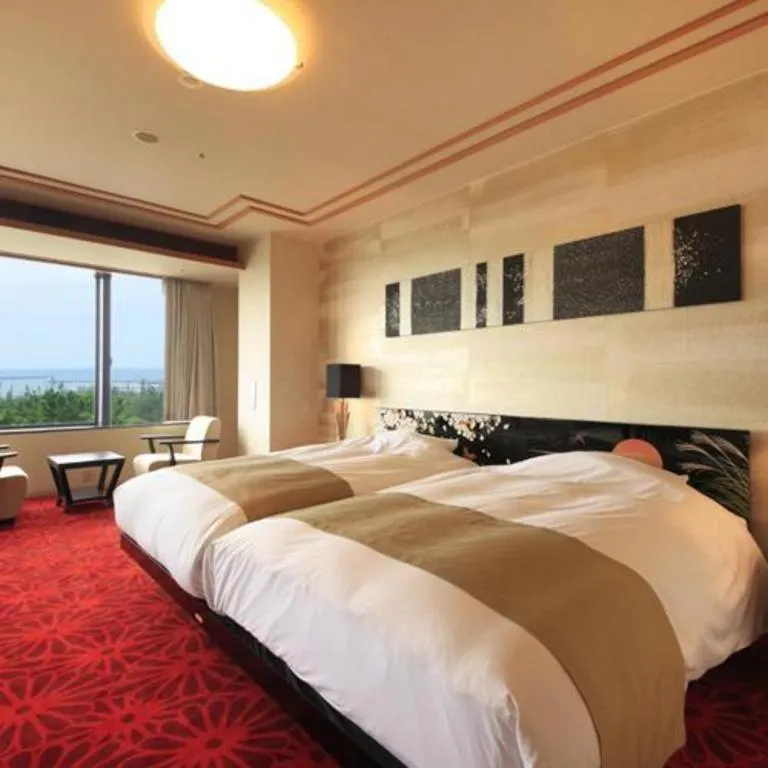 Bed in Centurion Hotel Technoport Fukui- Artificial Radium Hot Spring