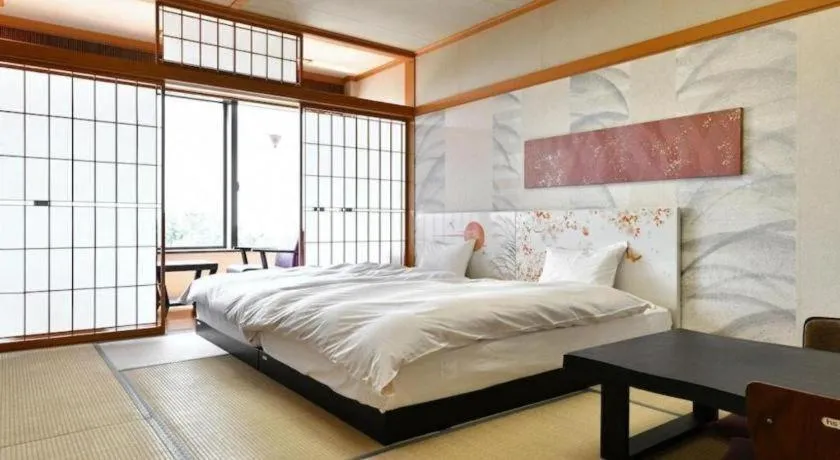 Bed in Centurion Hotel Technoport Fukui- Artificial Radium Hot Spring