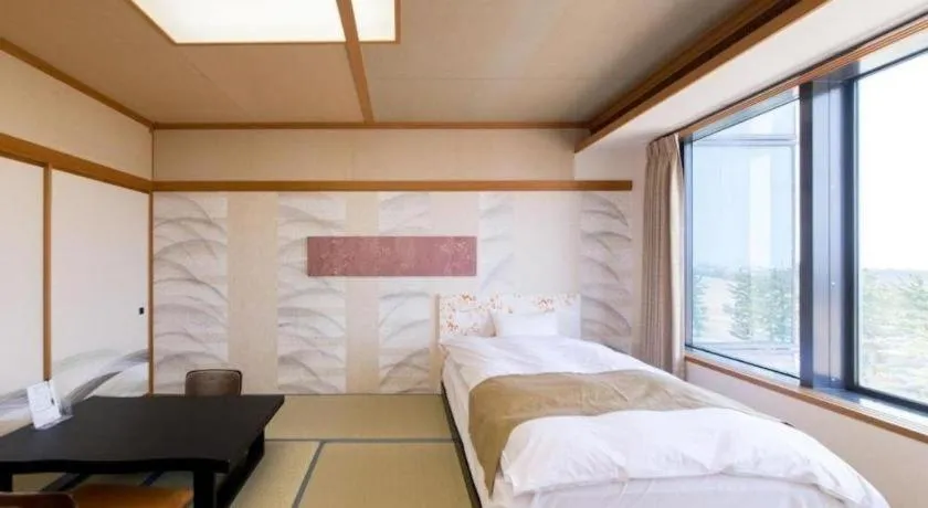 Bed in Centurion Hotel Technoport Fukui- Artificial Radium Hot Spring