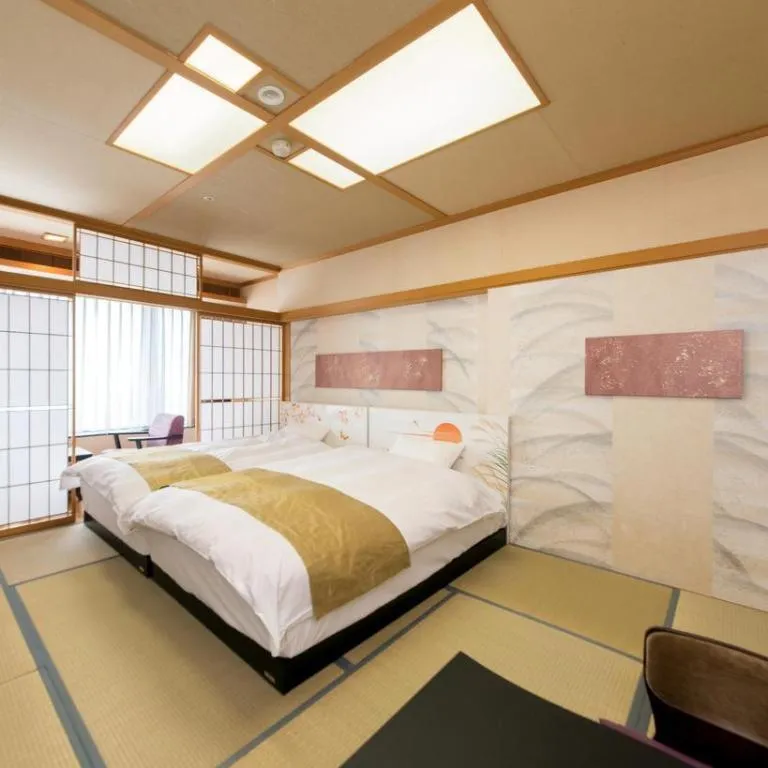 Bed in Centurion Hotel Technoport Fukui- Artificial Radium Hot Spring