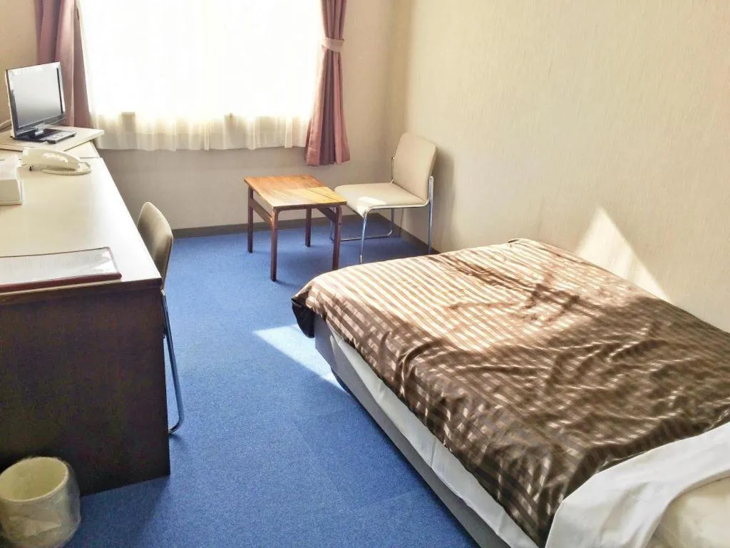 Bed in Ichimanri Hotel Golden Century