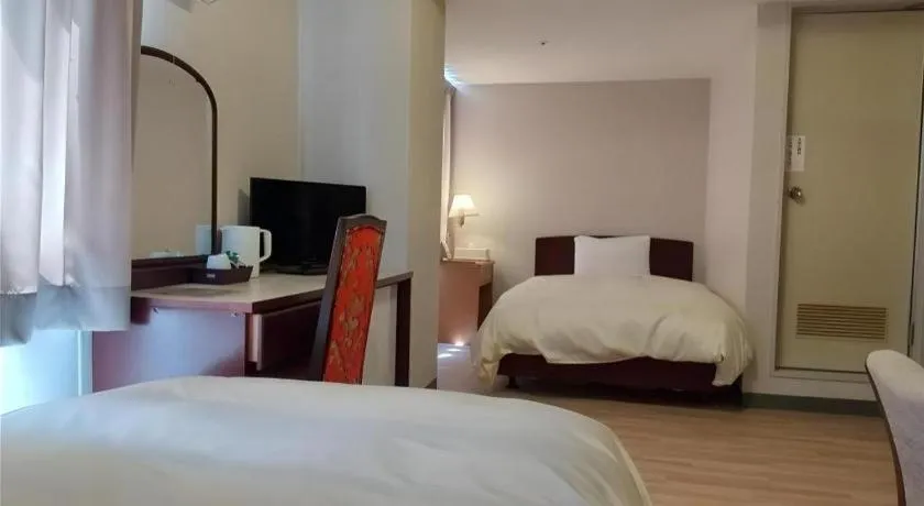 Bed in Ichimanri Hotel Golden Century