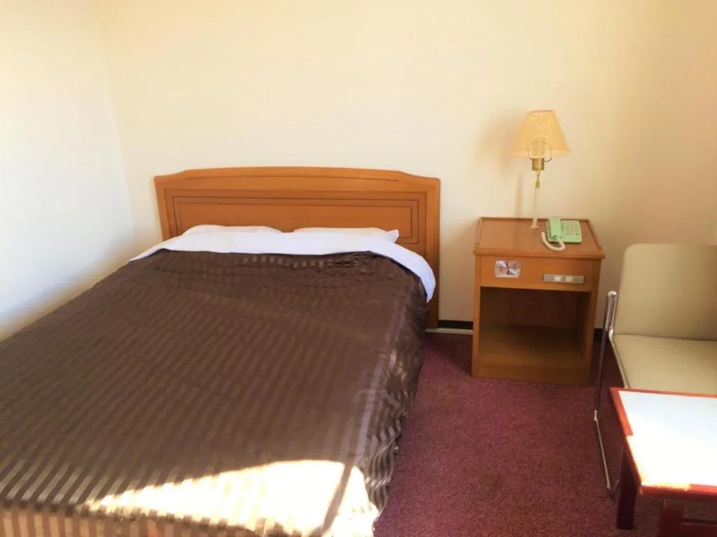 Bed in Ichimanri Hotel Golden Century