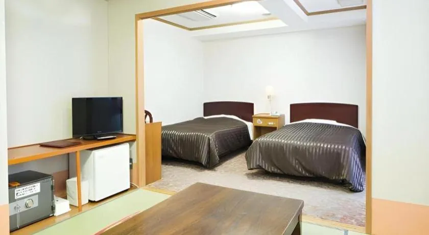 Bed in Ichimanri Hotel Golden Century