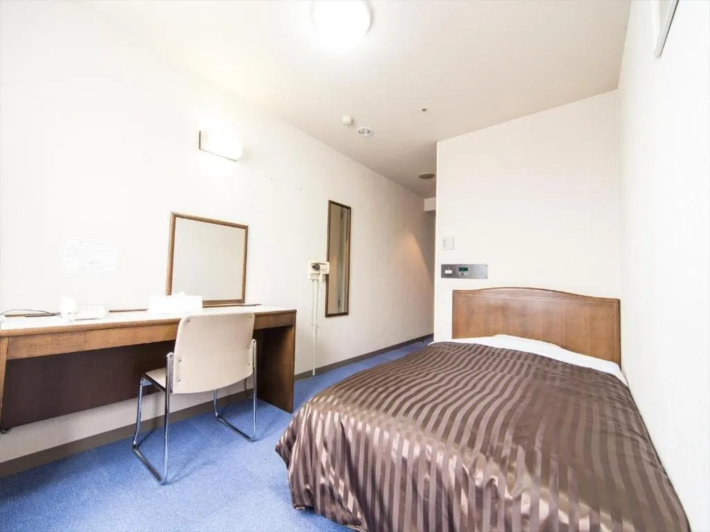 Bed in Ichimanri Hotel Golden Century