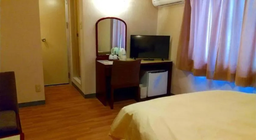 Bed in Ichimanri Hotel Golden Century