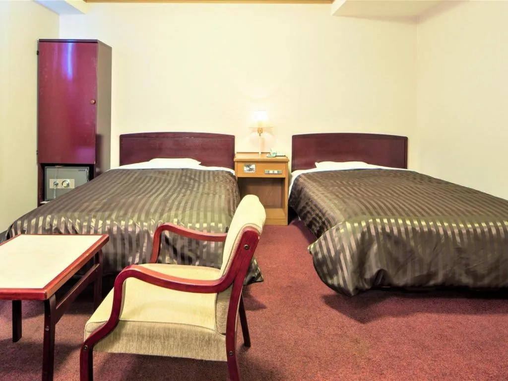 Bed in Ichimanri Hotel Golden Century