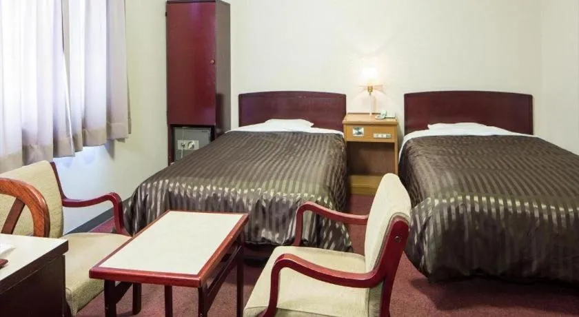 Bed in Ichimanri Hotel Golden Century