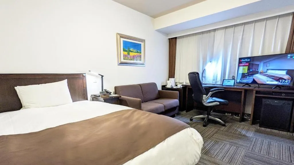 Bed in Hotel Sealuck Pal Takasaki