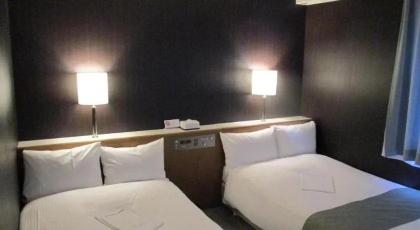 Bed in Niigata Keihin Hotel