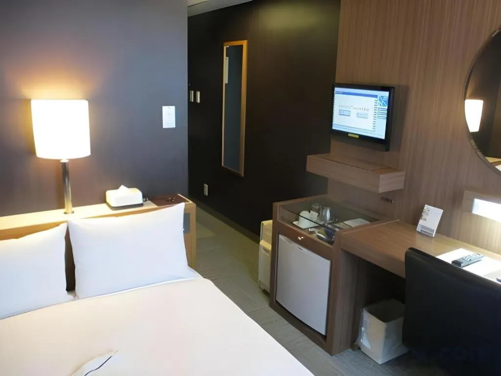 Bed in Niigata Keihin Hotel