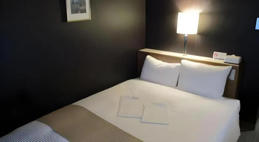 Bed in Niigata Keihin Hotel