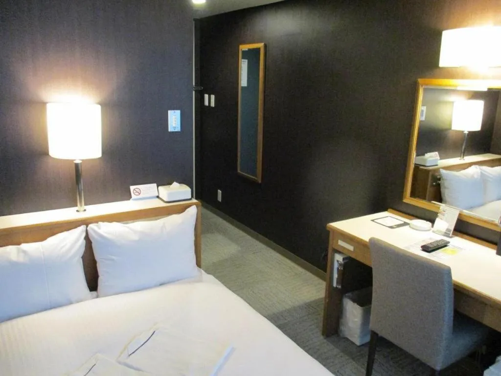 Bed in Niigata Keihin Hotel