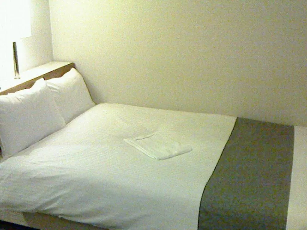 Bed in Niigata Keihin Hotel