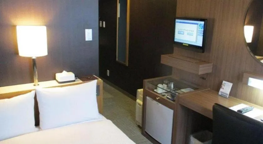 Bed in Niigata Keihin Hotel