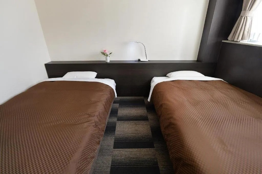 Bed in Business Hotel BL Kuwana