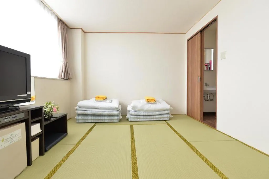 Bed in Business Hotel BL Kuwana