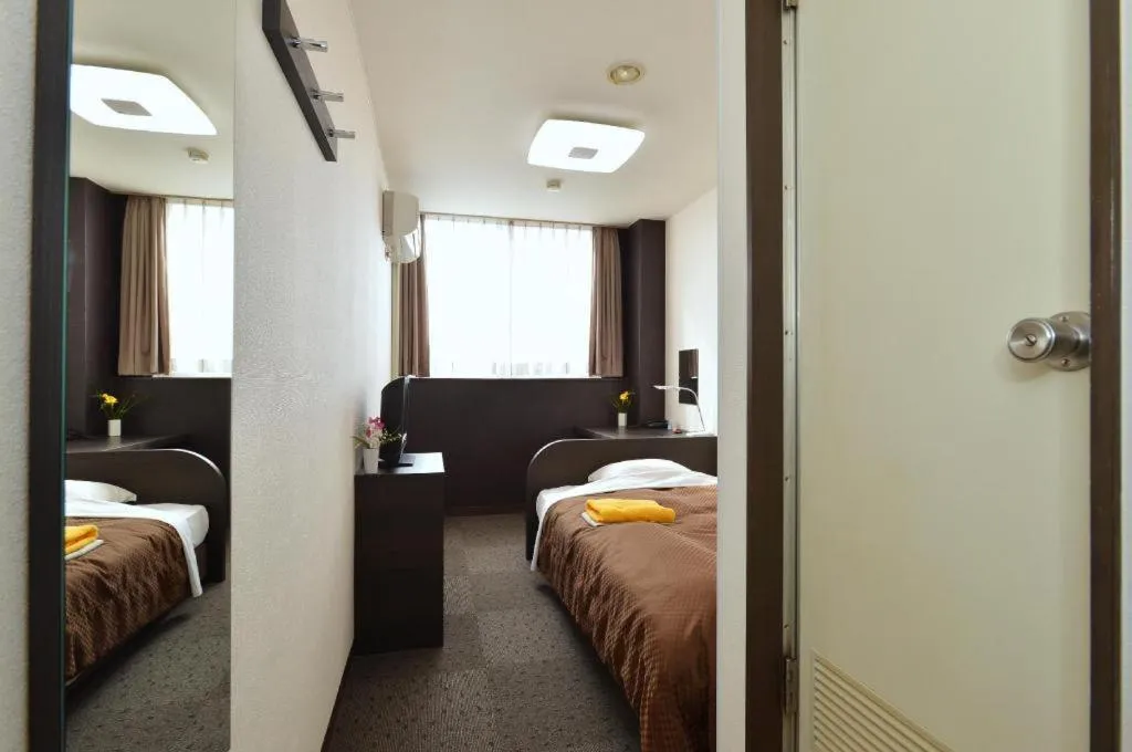 Bed in Business Hotel BL Kuwana