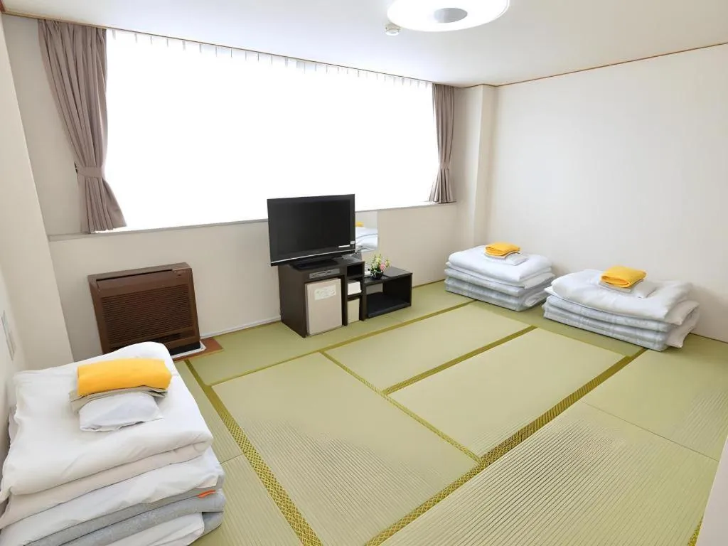 Bed in Business Hotel BL Kuwana