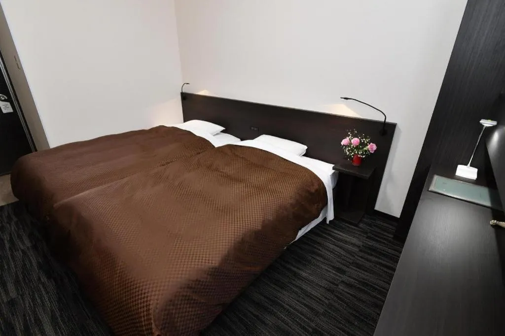 Bed in Business Hotel BL Kuwana