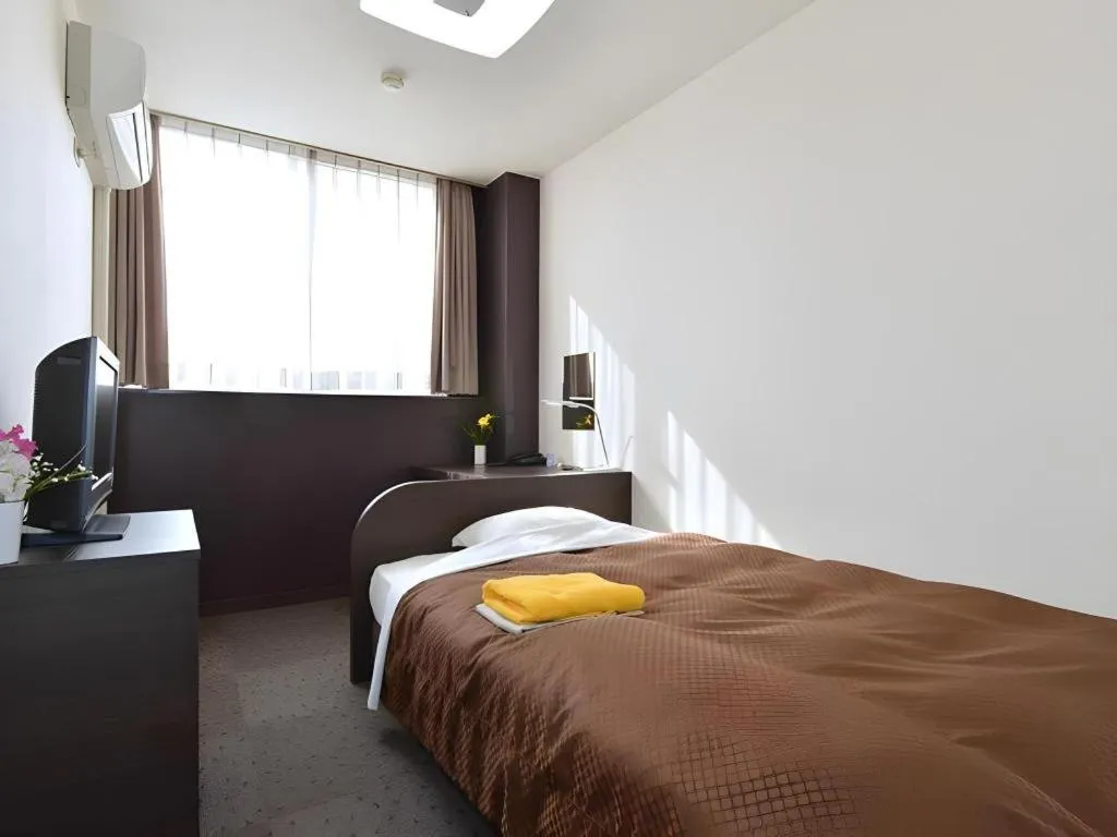 Bed in Business Hotel BL Kuwana