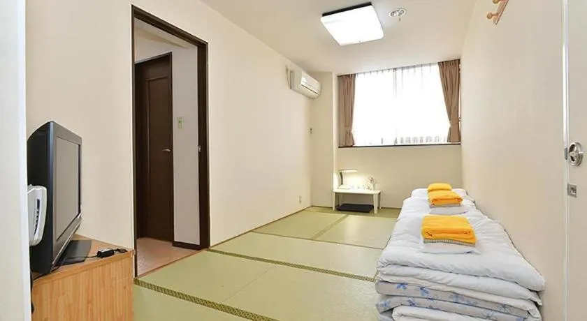 Bed in Business Hotel BL Kuwana