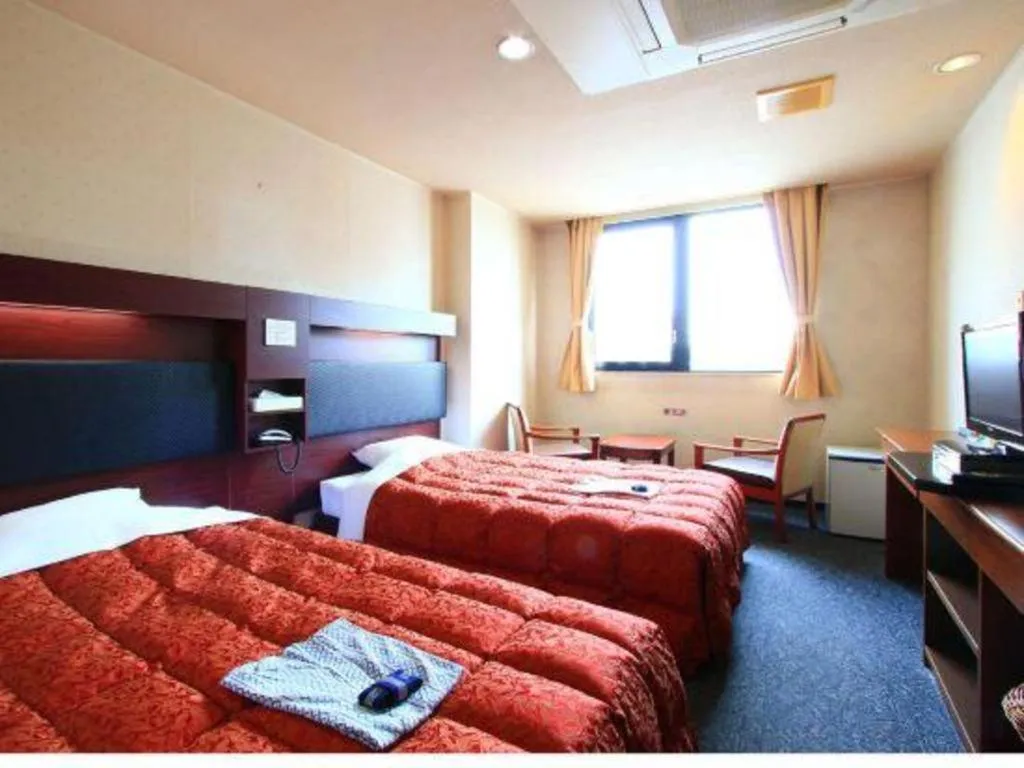 Bed in Hotel Honjin