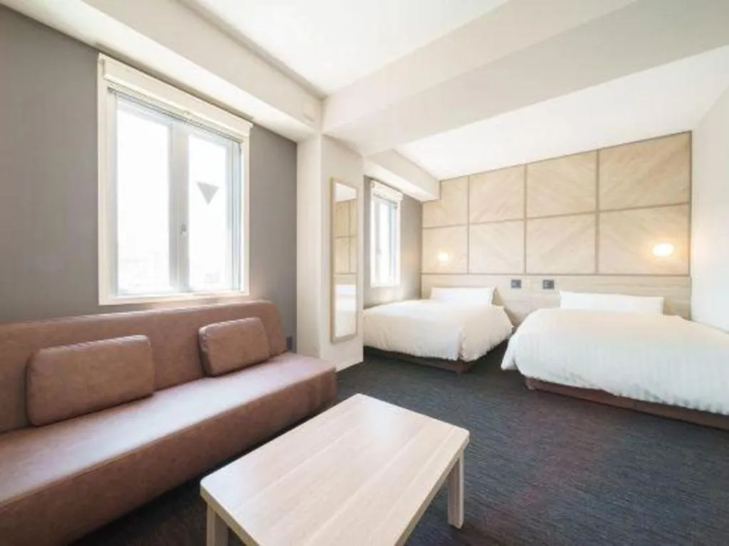 Bed in Super Hotel Satsuma Sendai