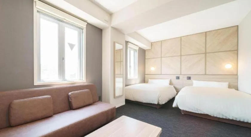 Bed in Super Hotel Satsuma Sendai