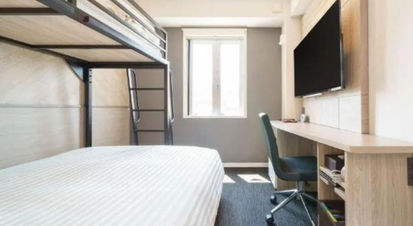 Bed in Super Hotel Satsuma Sendai